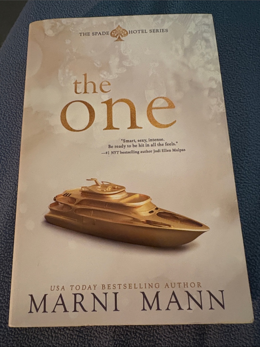 Marni Mann "The One" Paperback Book - Gold & Cream Cover